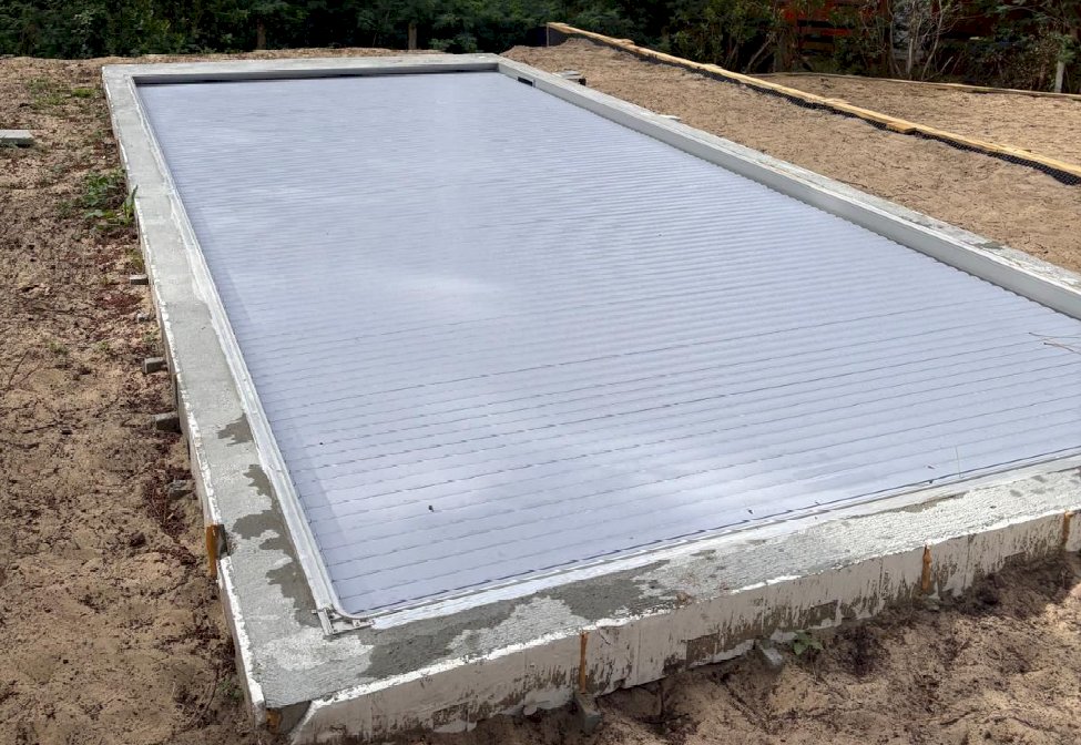 Construction d'une piscine classique en béton par Le Bassin Bleu